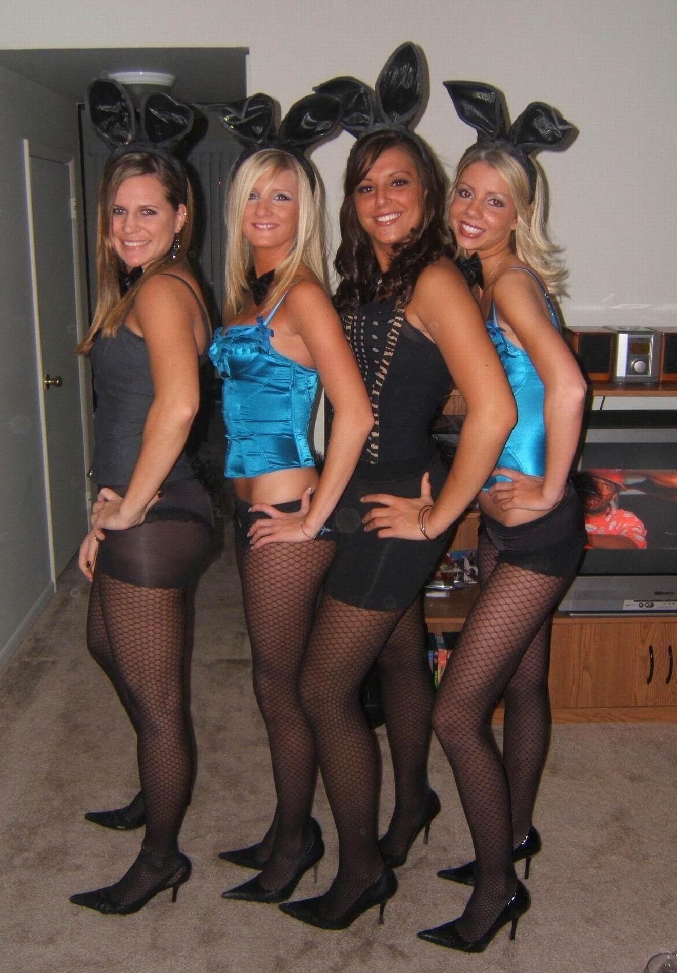 Four Bunny Girls wearing Black Fishnet and Nylon Tights, Stilettos and Bustiers